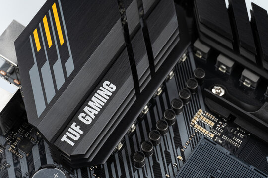 Dnipro, Ukraine - April 10st, 2023: ASUS TUF Gaming B550M-Plus on white background. TUF - The Ultimate Force - gaming line of productive computer equipment from the company Asus.