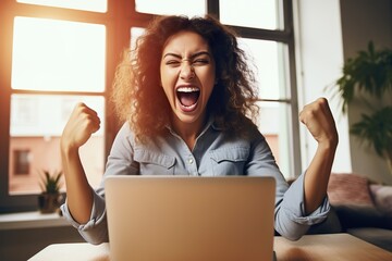 Happy young woman feeling winner rejoicing online win got new job opportunity, overjoyed motivated mixed race girl student receives good test results on laptop celebrating admission
