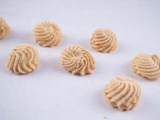 Sago Cookies are neatly presented. They are isolated against a white background.