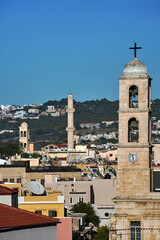 Church bell towers and minaret in the city of Chania on the island of Crete