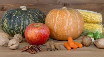 Composition with vegetables for seasonal on wooden background.