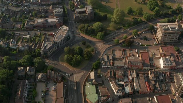 Pan down aerial shot over Maidenhead roundabout