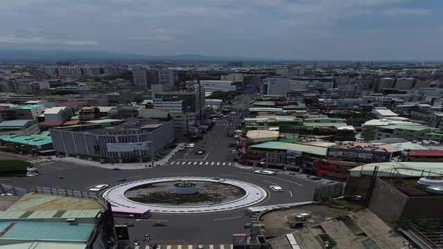 Aerial 4K Drone Footage of Chiayi City by drone in Taiwan. Bustling city, transportation shot from above. Aerial vertical video, vertical video background.