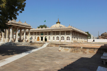 Fototapeta premium Courtyard pavilion at Sarkhej Roza, tomb complex, Ahmedabad, Gujarat. Tomb of Sheikh Ahmed Khattu Ganj Baksh