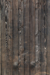 Fond de planche de bois sombre en chêne ou sapin noir.