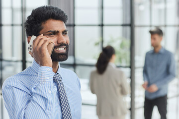 professional businessman executive entrepreneur wearing holding telephone making corporate call on cellphone.