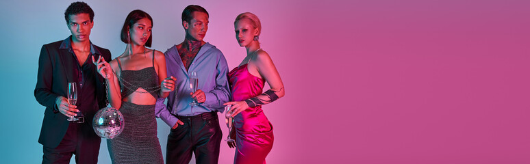 four multicultural friends holding champagne glasses and disco ball on purple pink backdrop, banner
