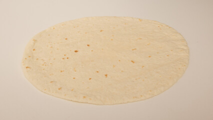 Corn tortillas on white background. Unleavened bread