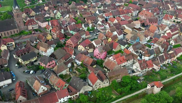 Aerial view above the beautiful French village of Bergheim and its surrounding vineyards - Alsace, France