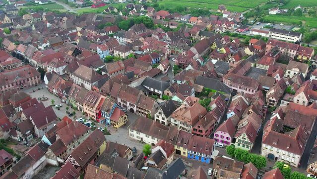 Aerial view above the beautiful French village of Bergheim and its surrounding vineyards - Alsace, France