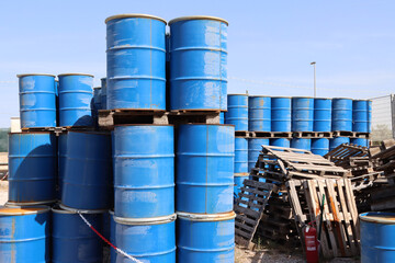 Blue drums for storing radioactive materials in a contaminated site