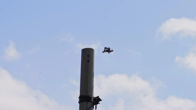 FPV unsuccessfully lands on a pole, falls to the ground