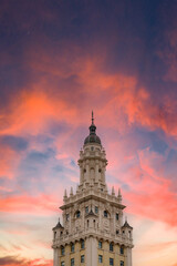 Stock image historic gothic building on fire sunset sky