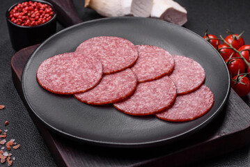 Delicious fresh smoked sausage with salt and spices cut into slices