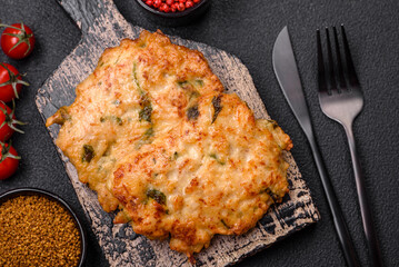 Delicious fried chicken chop or pork meat fried breaded with salt, spices and herbs