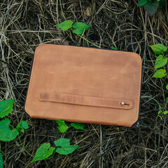 Leather Bag. A handbag or sling bag made of brown leather in a minimalist style or a minimalist and...