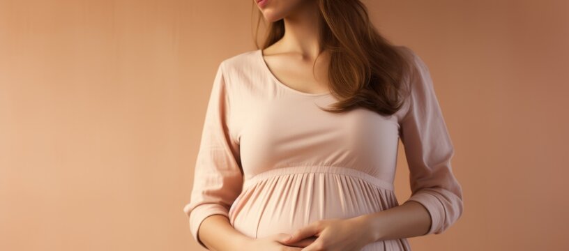 A close-up image of the mom-to-be's pregnant stomach