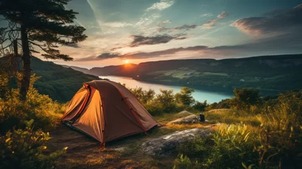  A camping tent in a nature hiking spot, Relaxing during a Hike in mountains, next to lake river © sirisakboakaew