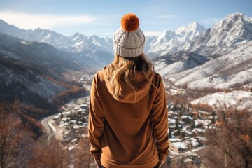 A woman standing on a mountain looking at a valley. Imaginary AI illustration of winter sports.