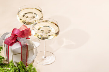 Two champagne glasses and gift box