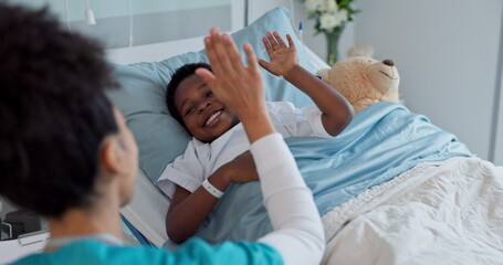 Happy woman, doctor and high five with kid patient for success, teamwork or good job on hospital...