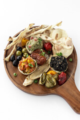 vegan tapas snacks sharing platter board on white background - 659937514