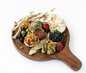 vegan tapas snacks sharing platter board on white background - 659937532
