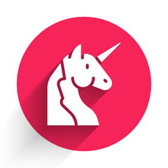 White Unicorn icon isolated with long shadow. Red circle button. Vector
