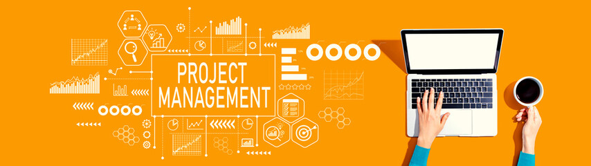 Fototapeta premium Project management theme with person using a laptop computer