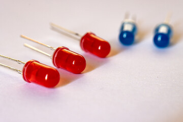 A row of Through Hole led diodes, red and blue, electronic component