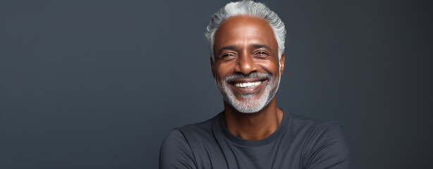 Beautiful black man with smooth healthy face skin. Gorgeous aging mature man with gray hair and...