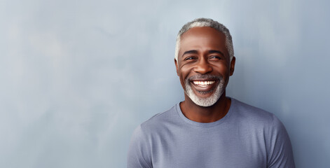 Beautiful black man with smooth healthy face skin. Gorgeous aging mature man with gray hair and...