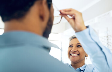 Optometrist, eye care service or customer with glasses for vision in a retail optical or eyewear...