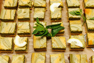 Sweet pie slices on a buffet.