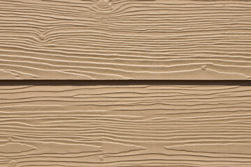 Close-up shot of the fake wood panel surface.