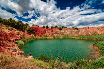 The spectacular colors of the Bauxite Quarry in the surroundings of Otranto, Lecce province in...