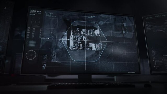 Modern monitor. Location track. Destination approved. Data processing. Satellite footage from the Mittelplate oil platform in Germany is broadcasted on the screen. Computer User Interface.