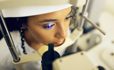 Woman, face and eye exam with vision and laser machine, health and vision with top, optometry and...