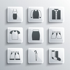 Set Umbrella, Socks, Short or pants, Skirt, T-shirt, Woman dress and Shirt icon. Vector