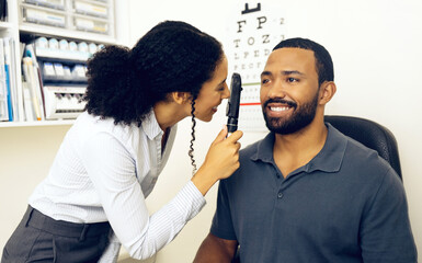 Patient, eye care and healthcare in clinic with ophthalmoscope to check for glaucoma, ocular services and assessment. Optician, woman and retina analysis for eyesight of happy man with expert tools