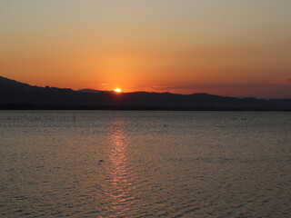 Beautiful golden sunset on the lake
