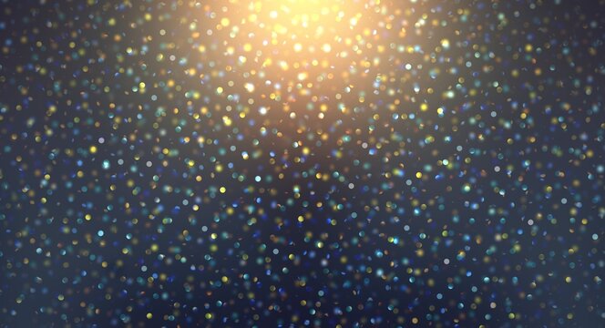 Holographic sparkles flaying in briight yellow light top on black background.