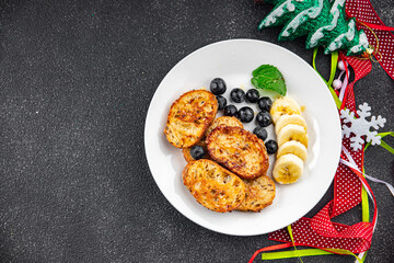 pancake day sweet toast fruit bread fried in egg holiday breakfast Christmas sweet dessert holiday treat new year and christmas celebration meal food snack on the table copy space food 
