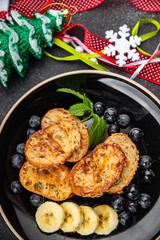 pancake day sweet toast fruit bread fried in egg holiday breakfast Christmas sweet dessert holiday treat new year and christmas celebration meal food snack on the table copy space food 