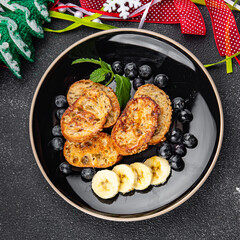 pancake day sweet toast fruit bread fried in egg holiday breakfast Christmas sweet dessert holiday treat new year and christmas celebration meal food snack on the table copy space food 