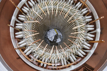 Closeup view of stator winding in electric machine.