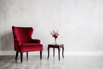 red velvet armchair in a monochrome, minimalist room