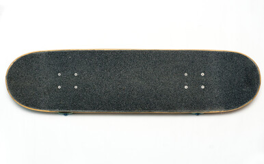 Skateboard top view on white background. 