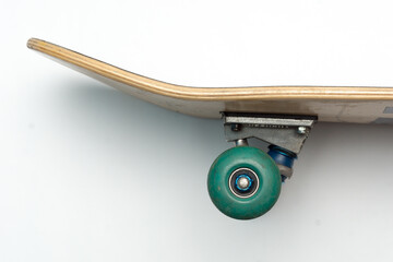 Skateboard side view on white background. New skateboard.  © DAVISUALS