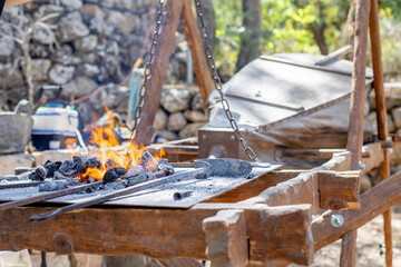 the Kuznetsk table with fire and coals has bellows for pumping up sour water.